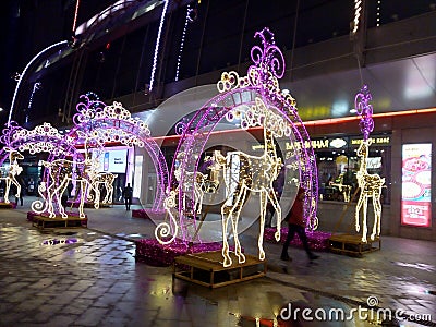 Luminous figures of deer in front of the shopping center Editorial Stock Photo