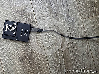 Lumix Battery charger and cable Editorial Stock Photo