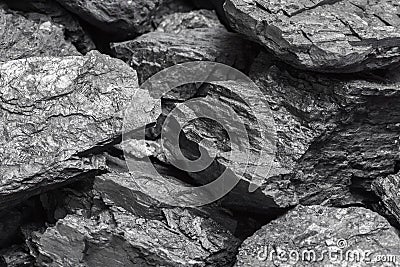 Lumps of black lignite or bituminous coal. Natural source of energy. Mineral stone rock Stock Photo