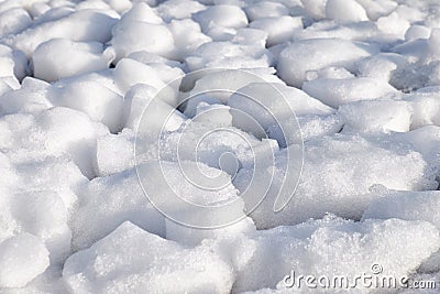 Lumps of snow and ice frazil on the surface of the freezing rive Stock Photo