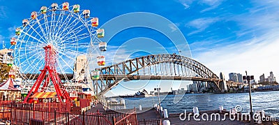 Luna park wheel with harbour bridge arch in Sydney, Australia. Stock Photo