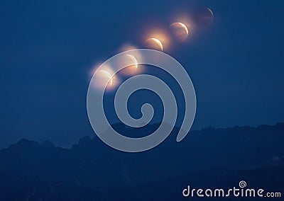 Lunar eclipse over the High Tatra mountains. Time series image Stock Photo