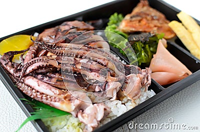 Lunch box grilled squid Stock Photo