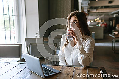 Lunch break during work. Thoughtful business lady Stock Photo