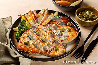 Lunch with grilled swordfish with garlic, lemon and capers butter sauce Stock Photo