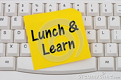 Lunch and Learn, computer keyboard and sticky note Stock Photo