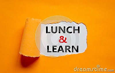 Lunch and learn symbol. Words `Lunch and learn` appearing behind torn orange paper. Beautiful orange background. Business, Stock Photo