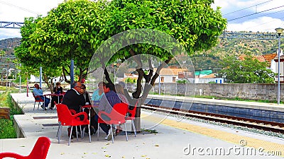 Lunch on Station Platform Editorial Stock Photo