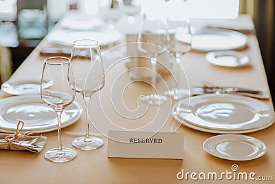 Lunch tablecloth with received name plate in restaurant. Stock Photo