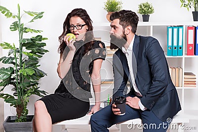 Lunch time. Office couple. Office flirt. Career company. Flirting and seduction. Sexy secretary. Office job affair Stock Photo