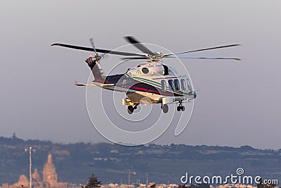 Luqa, Malta - 17 December 2015: AW189 leaving to oil rig. Editorial Stock Photo