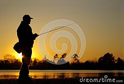 Lure fishing. fisherman fishing at sunset Stock Photo