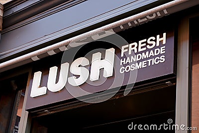 Lush fresh handmade cosmetics logo sign and text brand front of store of beauty Editorial Stock Photo