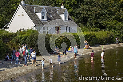 Luss, Argyll & Bute, Scotland, August, 25, 2019: Hundreds of people visit a small picturesque village on the west bank of Loch Lom Editorial Stock Photo