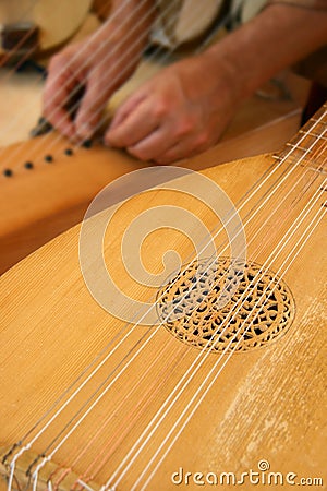 A lute-maker at work Stock Photo