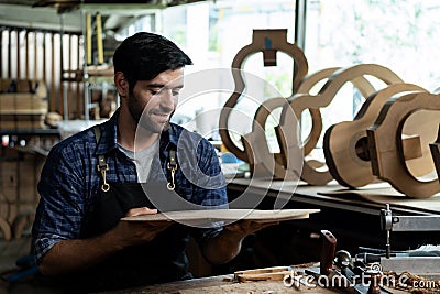 Guitar Bracing Inspection by Luthier Stock Photo