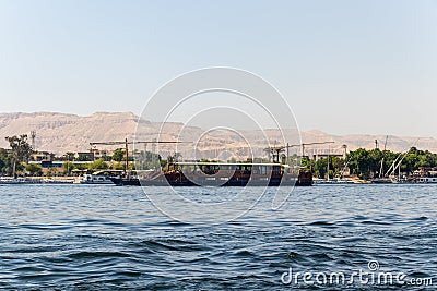 Tourist riverboat cruising on the Nile in Luxor, Egypt Stock Photo