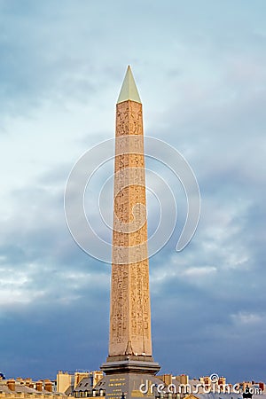 Luxor obelisk on a cloudy sky, France Editorial Stock Photo