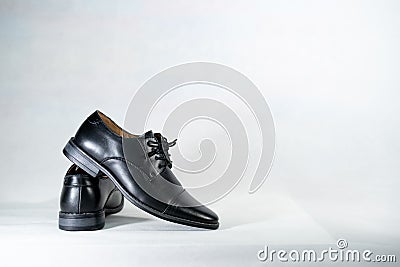 Luxuary man leather black shoe on the white isolation backtground Stock Photo