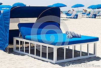 Luxurious beach bed with canopy on a sandy beach Stock Photo