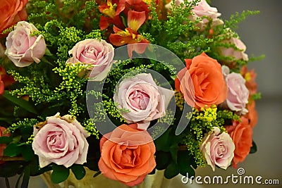 A luxurious bouquet of fresh flowers in a crystal vase on the holiday table and an elegant portion in the restaurant Stock Photo