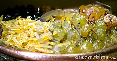 Luxurious candied fruit are in the pastry shops Stock Photo