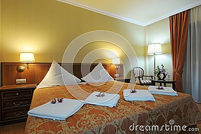 Luxurious hotel bedroom Stock Photo