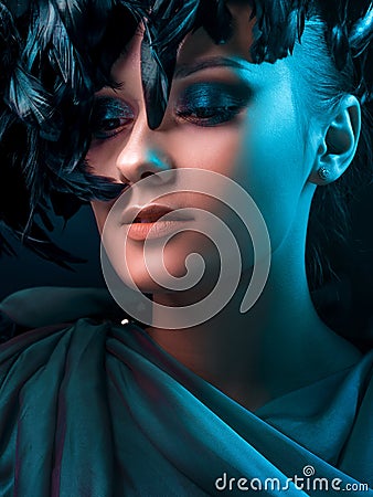 Luxurious mystical portrait, femme fatale in green. Stock Photo