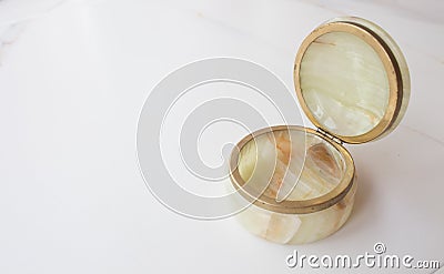 Luxurious natural onyx jewelry box on white marble. top view, minimalism concept. vintage casket onyx Stock Photo