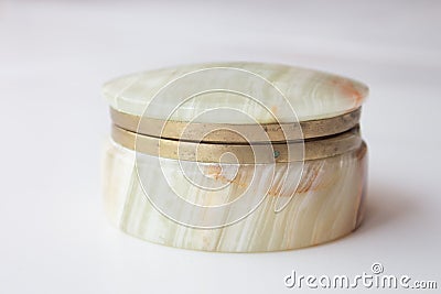 Luxurious natural onyx jewelry box on white marble. top view, minimalism concept. vintage casket onyx Stock Photo