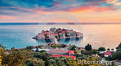 Luxurious resort and popular tourist destination Sveti Stefan town. Amazing sunset seascape of Adriatic sea, Montenegro, Europe. B Stock Photo
