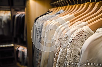 Walk in closet. Hangers in dressing room. Stock Photo