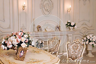 Luxury apartment, comfortable classic living room. Luxurious vintage interior with fireplace in the aristocratic style. Stock Photo