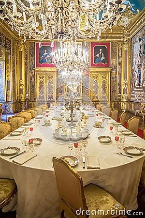 Luxury Baroque dining room with gala dinner table setting Editorial Stock Photo