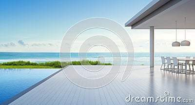 Luxury beach house with sea view swimming pool and empty terrace in modern design, Outdoor dining at vacation home for big family Stock Photo