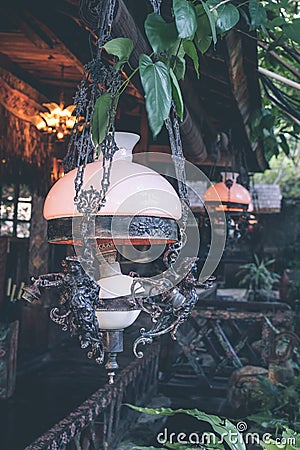 Luxury beautiful retro vintage light lamp decor, restaurant of Bali island, Canggu, Indonesia. Stock Photo