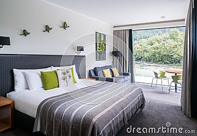 Luxury bedroom interior at Milford Sound Lodge Editorial Stock Photo