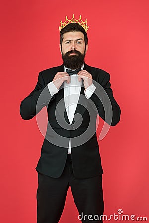 Luxury. Big boss. Formal event. King crown. Egoist. Businessman in tailored luxury tuxedo and crown. Luxury man. Man Stock Photo