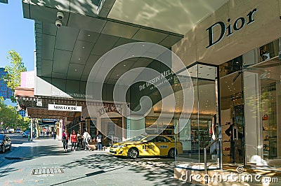 Luxury boutiques and hotels on famous Collins street in Melbourne Editorial Stock Photo