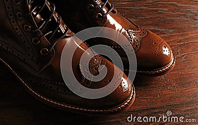 Luxury brown shoes on wood background Stock Photo