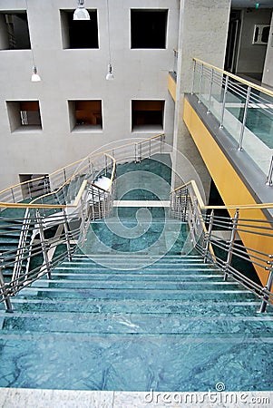 Luxury building entrance, reception and green marble staircase lobby Stock Photo