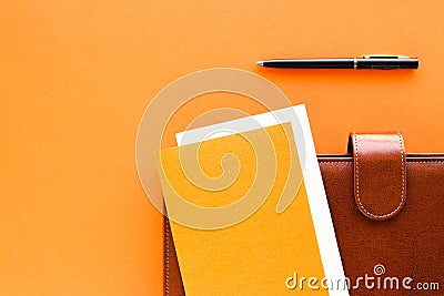Luxury business brown brief-case on the office table desk, flatlay Stock Photo