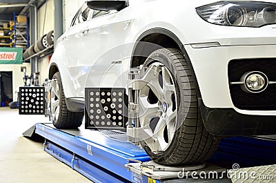 Luxury car BMW X6 on elevator inside car service Editorial Stock Photo