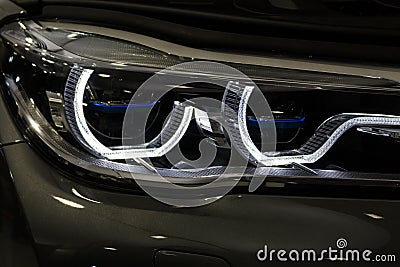 Luxury car headlight detail close-up Stock Photo