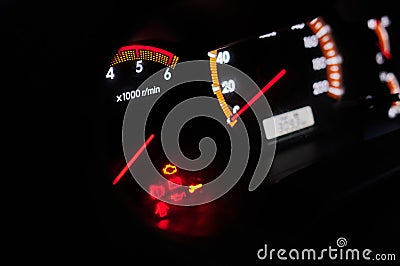 Luxury car speedometer close up. Speedometer arrows in dark colors. Stock Photo
