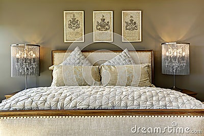 Luxury carved wood bed with pillows Stock Photo