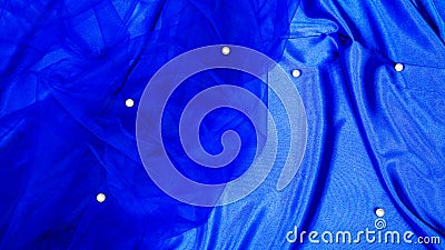 Luxury cloth or liquid wave. luxurious silk or satin with tulle and beads pearls fabric. abstract holidays background or elegant Stock Photo