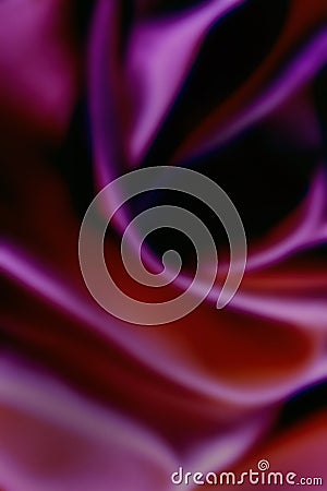 Luxury colorful blured background made from silk cloth with soft light and curvy shapes and waves. Abstract blured colorful backg Stock Photo