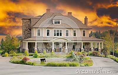 Luxury Country Mansion Home House Exterior Orange Fiery Sunset Sky Background Stock Photo