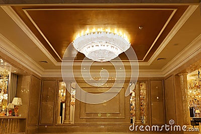 Luxury crystal chandelier lighting decorated in hall Stock Photo